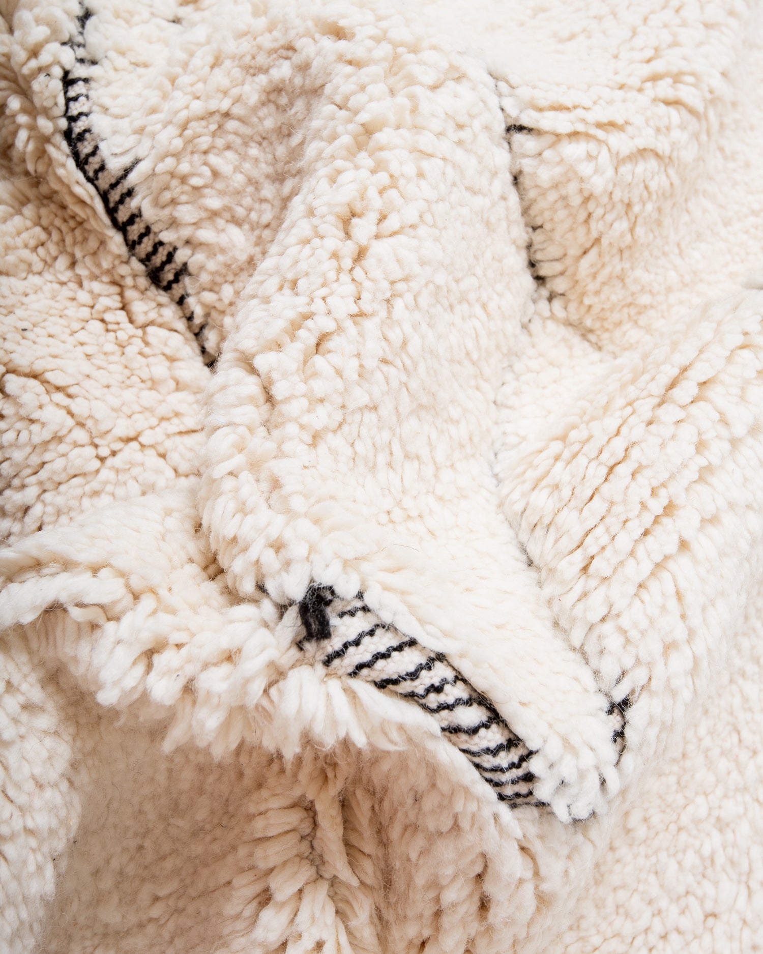 Modern, designer, handcrafted Berber rug from Morocco. Beniourain carpet with beautiful colours and patterns and fluffy wool texture.